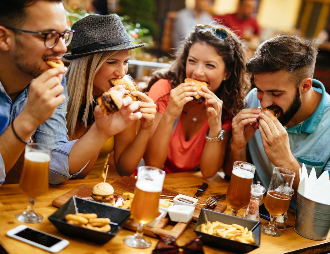 Friends sharing a meal at a restaurant
